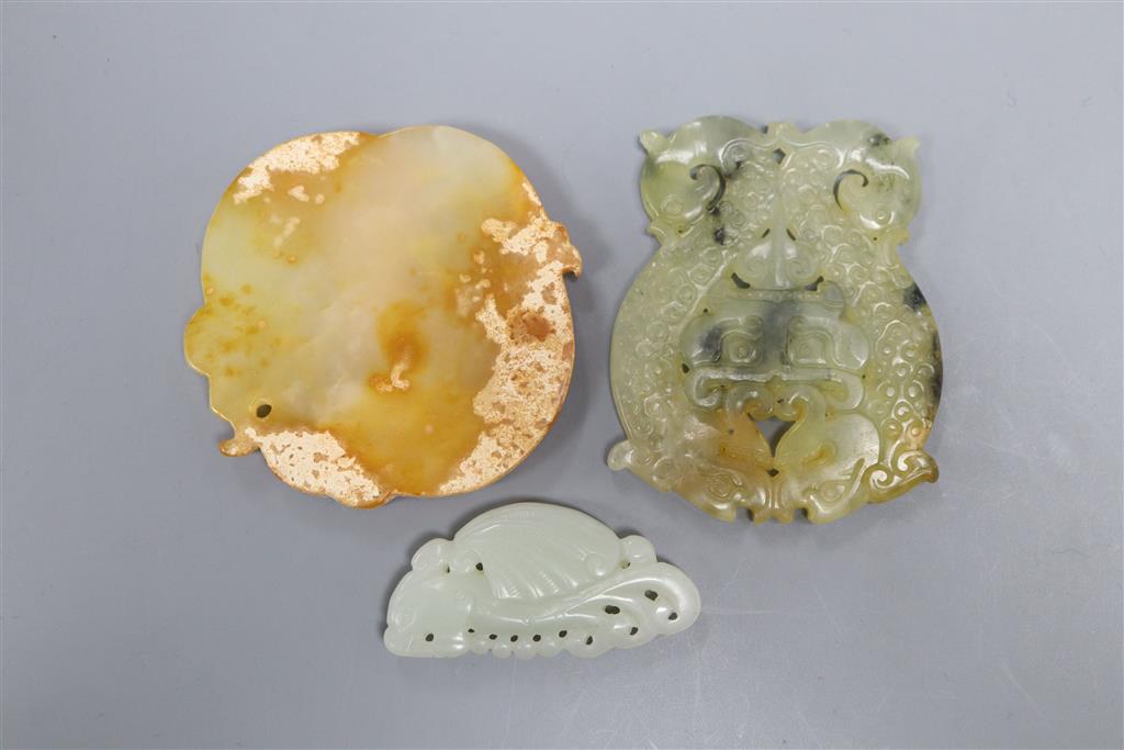 Three Chinese jade or hardstone plaques, 5.2 - 7.4cm